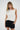 LNA Natia Tee in jet stream with knot detail on one shoulder