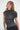 LNA off the shoulder on one side with ruching detailing on the side in black