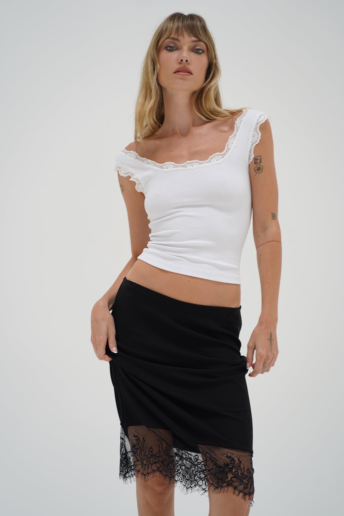 LNA Ryder lace trim skirt in black