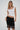 LNA Ryder lace trim skirt in black